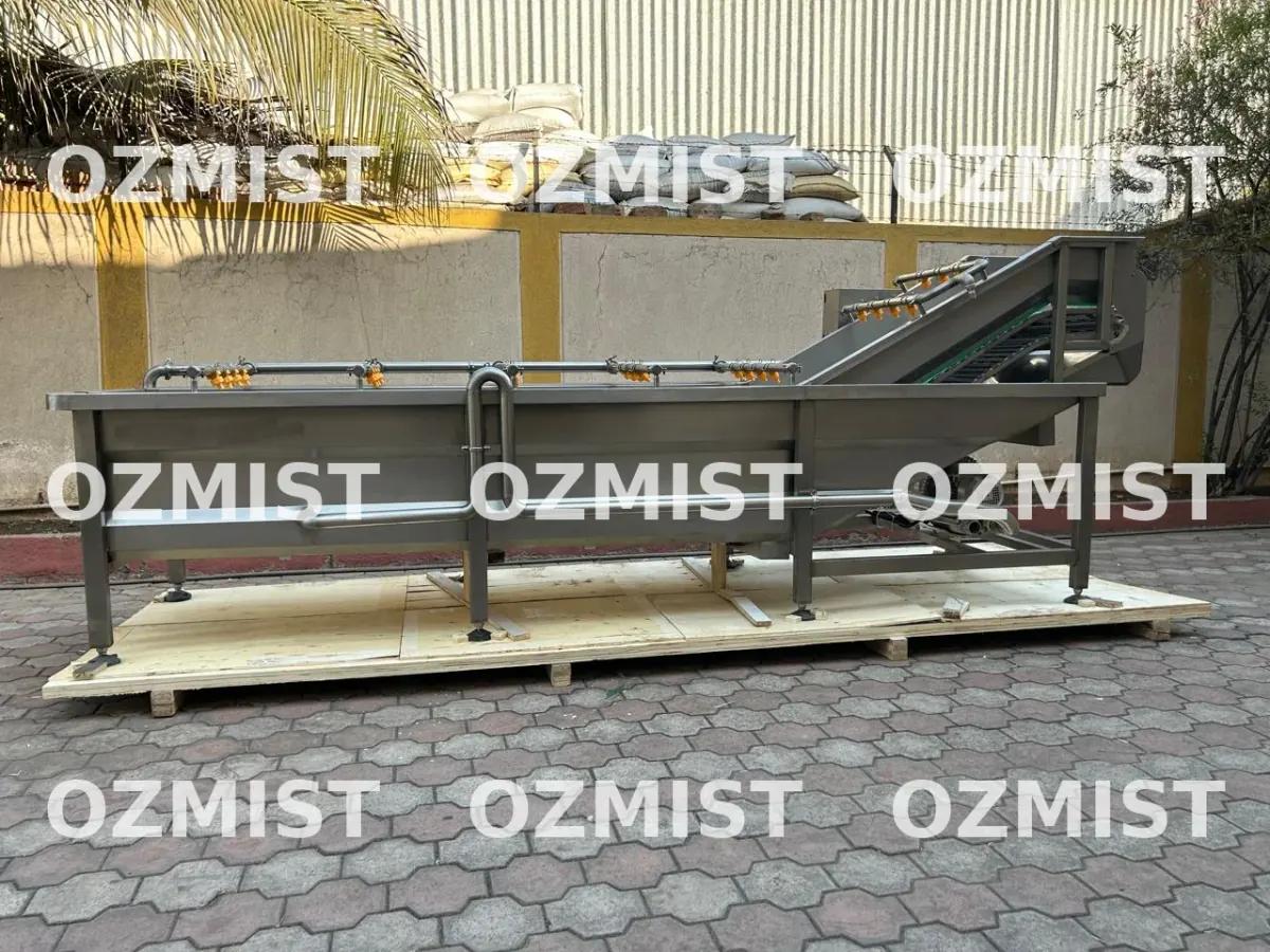Ozmist Food conveyor fruit and vegetable washer â€” continuous inline unit with pre-wet, bubble, spray rinse and dewatering zones